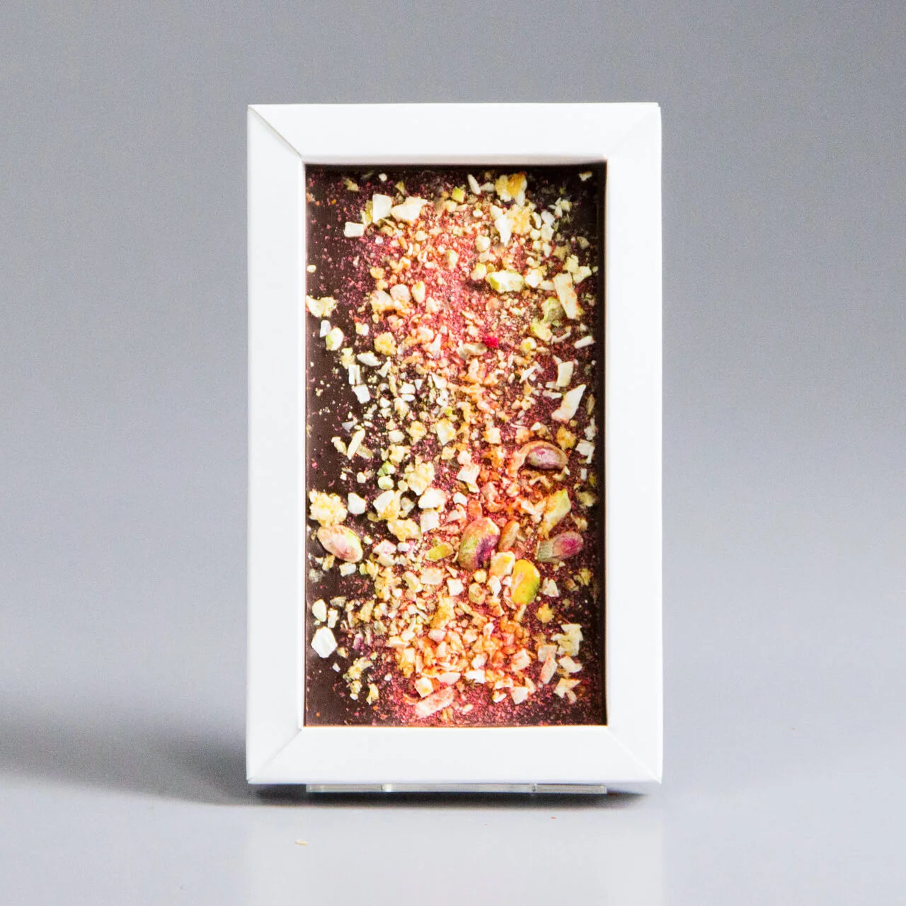 Тёмный шоколад с апельсином, перцем чили и фисташками НГ13